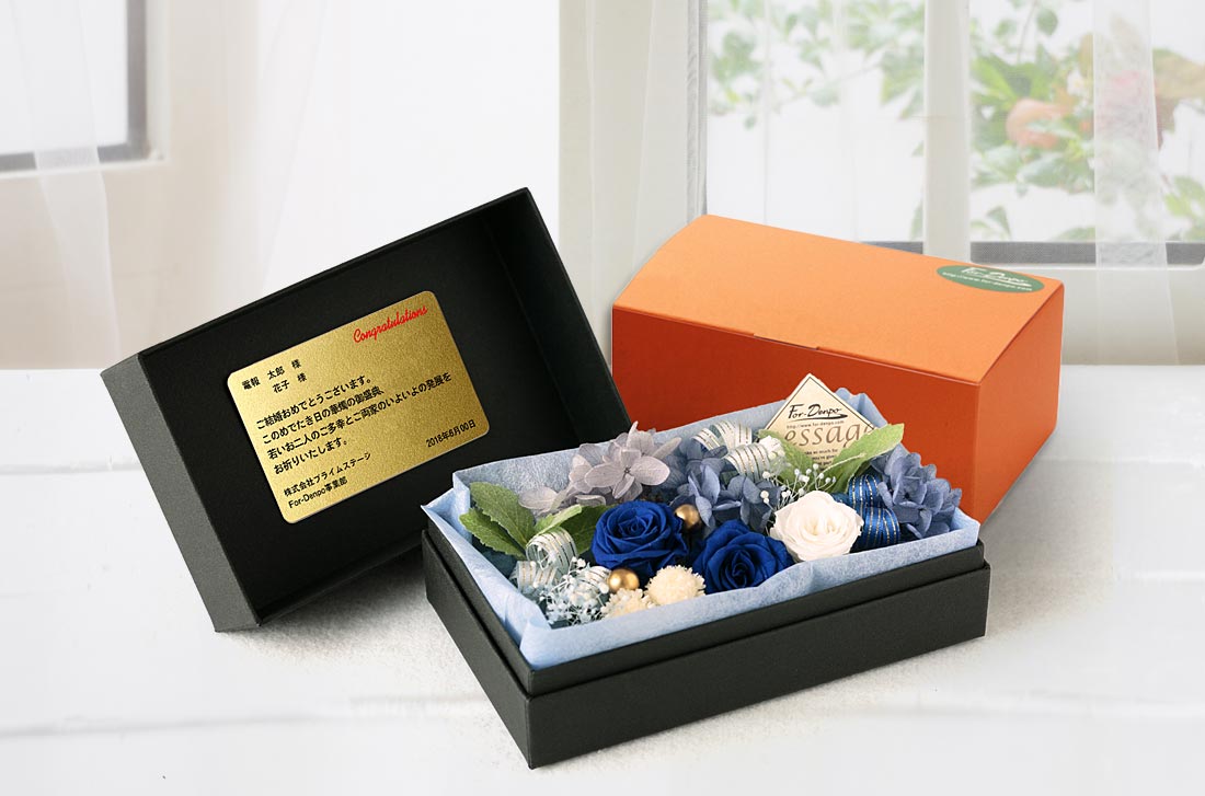 「Forever・ブルーローズの香」の電報のプリザーブドフラワーと専用オレンジ化粧箱のセット画像