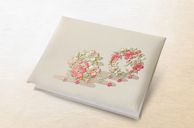 ピンクを基調とした優しく高貴な雰囲気の電報の「日本刺繍　華憐」