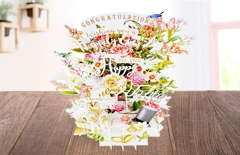 華やかな花のモチーフが飛び出すグリーティングカード『ポップアップカード wedding』。結婚式のお祝い電報として、祝福の気持ちを印象的に伝えるポップアップ型の祝電に最適な一枚。